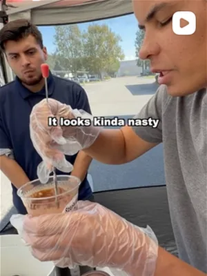 After: A video still: a drink being made, caption: It looks kinda nasty
