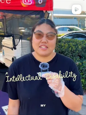 After: A video still: a team member talking about intellectual disability
